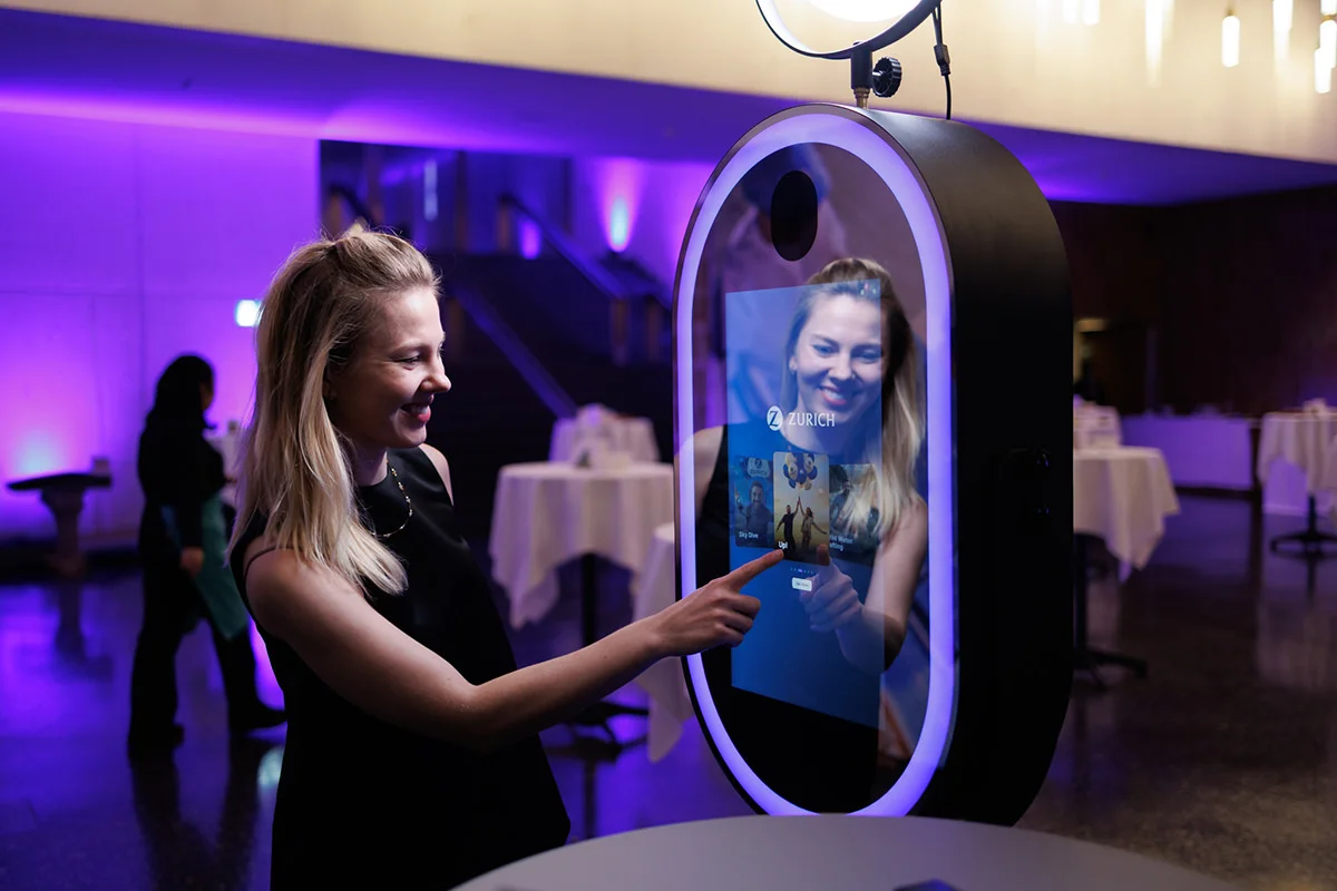 AI photo booth at a Zurich event in Switzerland – guest choosing a theme